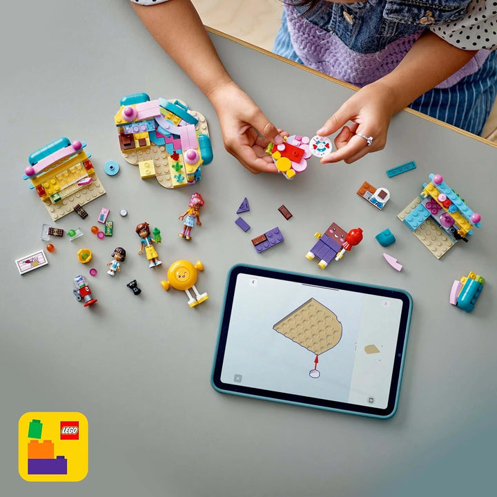 LEGO Friends Heartlake City Shop, set de joacă pentru fete cu vârsta peste 6 ani, joc de rol cu 2 mini-doll-uri, jucărie cu micro-doll și pisică 42649