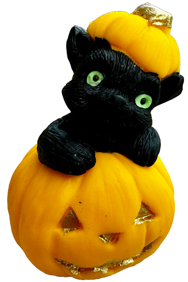 Edible decoration of sugar, pumpkin and black cat Halloween paste