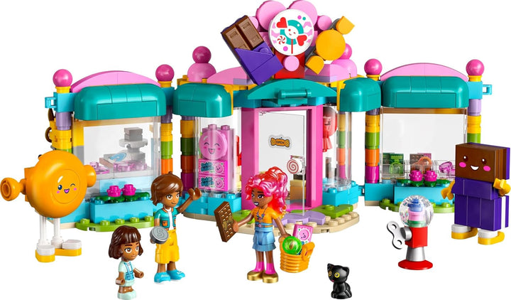 LEGO Friends Heartlake City Shop, set de joacă pentru fete cu vârsta peste 6 ani, joc de rol cu 2 mini-doll-uri, jucărie cu micro-doll și pisică 42649