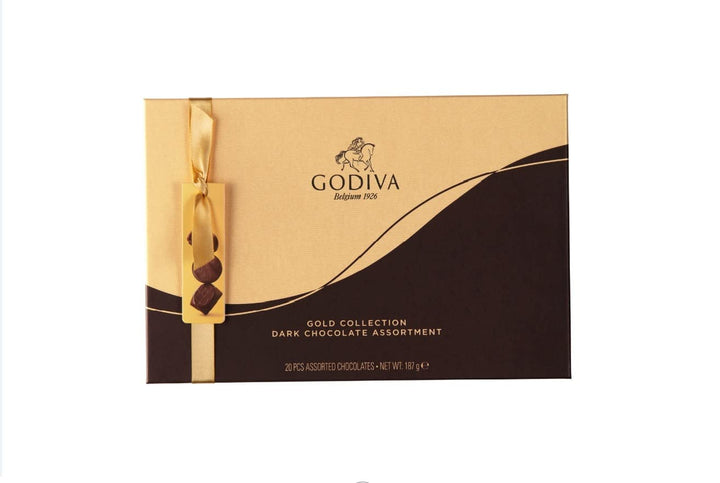 Ciocolată Godiva Connoisseur combinată cu fructul pasiunii, mousse de vanilie, caramel și alte umpluturi delicioase 