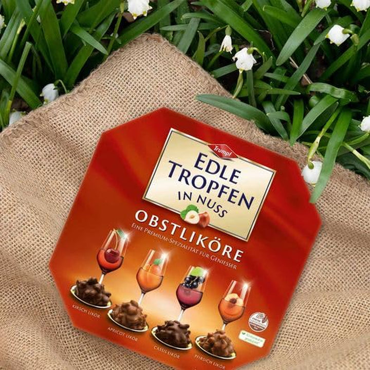 Edle Tropfen in Nuss Obstliköre 250G, Flüssig Gefüllte Schokoladenpralinen Mit Milchschokoladen-Überzug Und Knackigen Haselnuss-Splittern